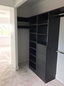 Built-In-Wardrobe-Laminex-Battalion-Colour-Board-Shelving-Bank-of-Drawers-Chrome-Hanging-Rods