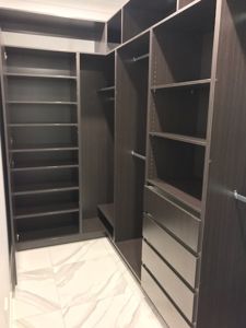 Built-In-Wardrobe-Polytec-Shannon-Oak-Colour-Board-Shelving-Banks-of-Drawers-Chrome-Hanging-Rods
