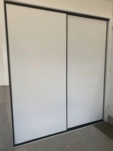Glacier-Robe-Doors-with-Black-Frame