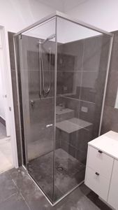 ShowerScreens_6mm_S3Core_MattSilverFrame_Corner_FrontAndReturn