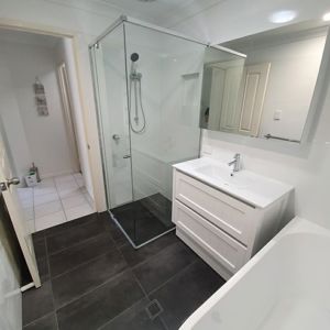 ShowerScreens_6mm_Inline_PolishedSilverHardware_Corner_ShavingCabinets_White_ThaceBathrooms