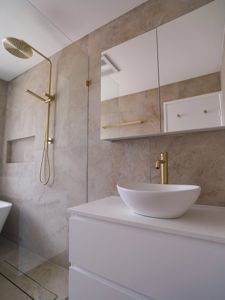 ShowerScreens_10mm_Panels_GoldHardware_ShavingCabinet_Mirror_White